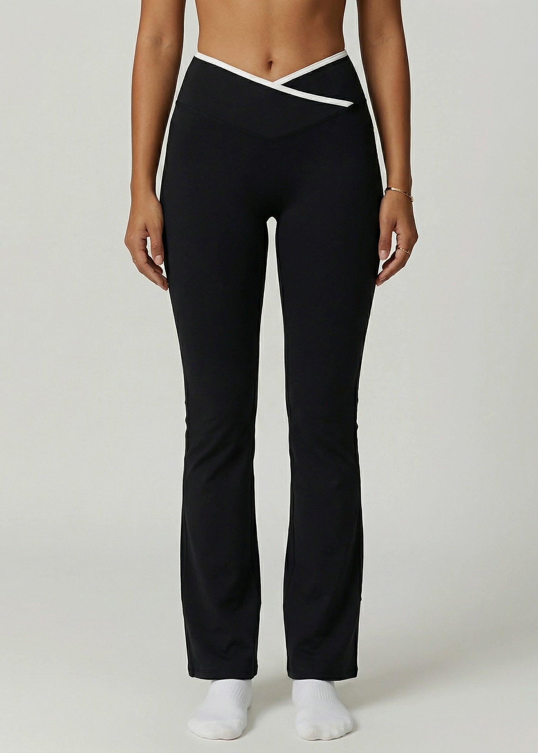 Bioloom Girl Wearing Nudetouch Flare Pants Front In color Black